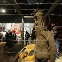 Barbed wire and Osprey wetsuit on display in Prague