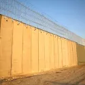 Israel installs new security barrier with concertina wire